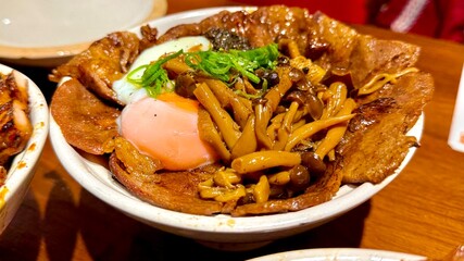 Grilled beef and egg onsen tamago with rice and mushroom