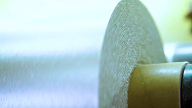 Industrial Grinding Wheel and Manufacturing Equipment Close-up