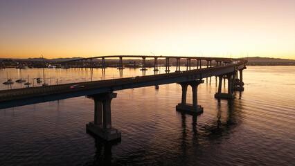 Fototapeta premium Silhouette of the Coronado Bridge at sunrise