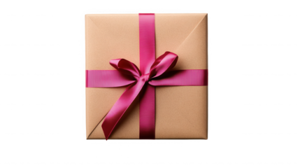 A square gift wrapped in tan paper with a pink ribbon and bow on a black background for a special occasion on transparent background