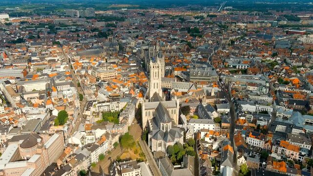 Ghent, Belgium. Cathedral of Saint Bavo. Panorama of the central city from the air. Cloudy weather, summer day. Drone footage