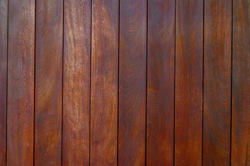 Richly textured wooden planks in warm brown tones