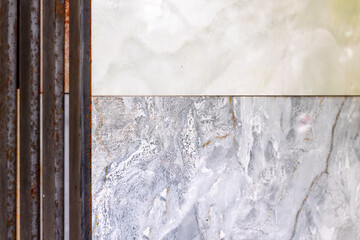 Industrial metal and marble texture contrast in architectural design