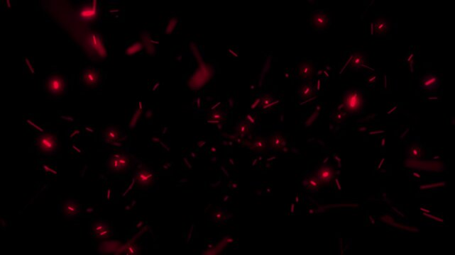 Energetic red sparks or fire embers fly towards camera on black background. Ideal for action, fire, or abstract concepts. Seamless loop