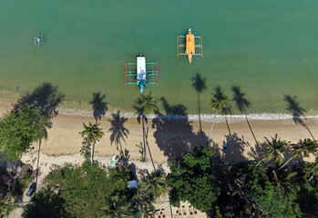 Aerial view of outrigger boats and beach , Palawan, The Philippines