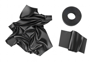 A collection of black fabric pieces. including a crumpled sheet. a flat sheet. and a roll of tape. arranged on a clean white background. ideal for design and textile projects
