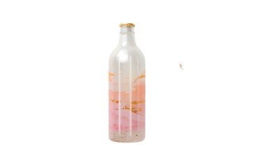 Clear glass bottle with pink liquid and label on black background