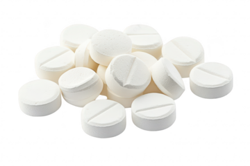 A close-up view of scattered white tablets on a clean surface. their round shape and split line. ideal for medical. pharmaceutical. or health-related contexts