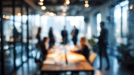 Modern meeting room setting with professionals engaged in discussion and collaboration during a busy workday