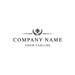 Elegant Logo Design with Laurel Wreath and Geometric Building Silhouette.