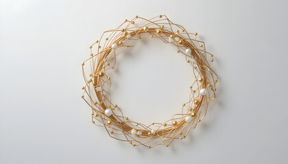 Fototapeta premium Elegant golden Christmas wreath with delicate white and gold ornaments for festive holiday designs and luxurious seasonal promotions, perfect for invitations