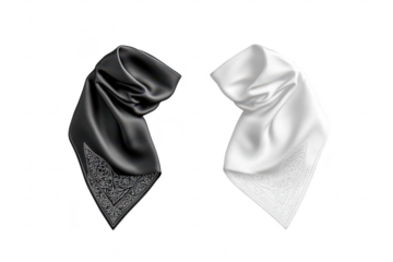 A stylish black and white silk scarf elegantly draped on a neutral background. intricate patterns. perfect for fashion accessories or design elements in promotional materials