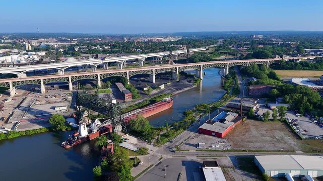 Freighter navigating Cuyahoga River approaching Collision Bend in Cleveland, Ohio, Scranton Flats neighborhood