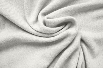 Cashmere scarf texture. Top view, close-up. The trendy color of the Year 2026, Cloud Dancer.
