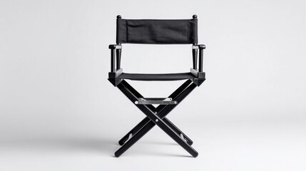 Fototapeta premium Classic black director's chair isolated on a clean white background