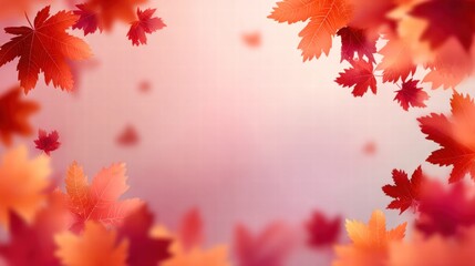 Fototapeta premium Autumn leaves falling against a soft, blurred background.