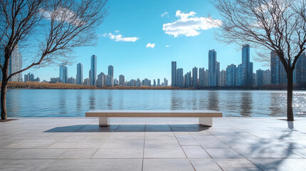 Empty bench overlooking city skyline waterfront on calm bright day with soft breeze