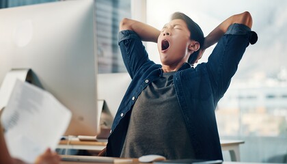 Tired asian male project manager yawning with arms behind head in office desk. Concept for office life, business fatigue and corporate exhaustion