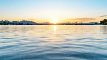 Obraz premium Serene sunset lake horizon calm water reflection