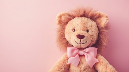Stuffed lion with a ribbon bow around its neck pastel background