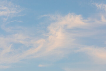 Evening Sky with Flowing Pastel Clouds at Dusk