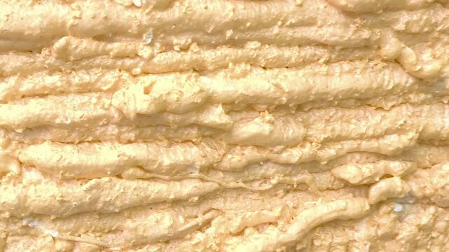 Yellow construction foam for wall, ceiling insulation close-up. Texture, uniform background