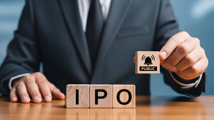 IPO announcement success with a businessman holding block in corporate office, initial public offering success, financial markets, investments and stock trading