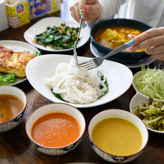young woman eatting  Southern Thai Cuisine in restaurant