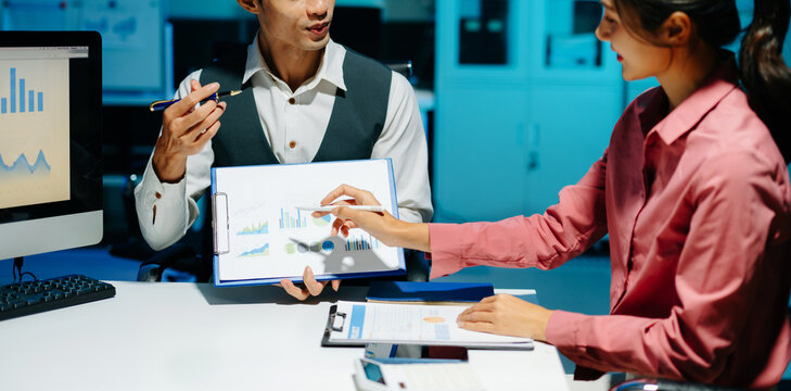 Business team meeting. professional investor working new start up project. Finance task. with smart phone and laptop and digital tablet computer - Powered by Adobe