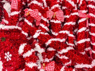 Red and White Christmas Tinsel With Decorative Bows