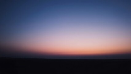 Fototapeta premium completeness. Serene twilight landscape with soft gradient sky, minimalistic natural scenery. travel magazines, destination branding, designed for outdoor magazines and nature guides.