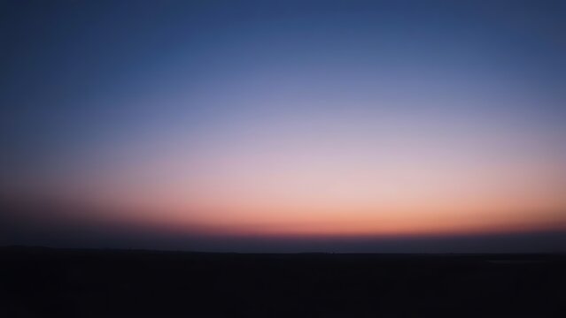 completeness. Serene twilight landscape with soft gradient sky, minimalistic natural scenery. travel magazines, destination branding, designed for outdoor magazines and nature guides.