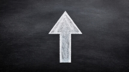 Fototapeta premium Teacher growth mindset arrow pointing upward drawn with chalk on blackboard inspiring progress and learning