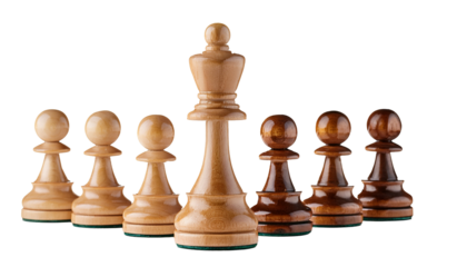 Chess pieces including pawns and a king are arranged on a surface with a bright white backdrop alpha channel with white background