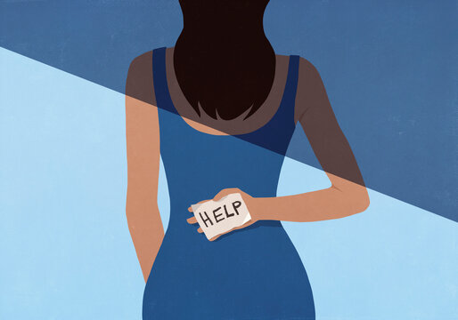 Woman in half shadow holding "Help" sign behind back against blue background
