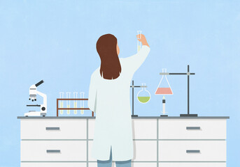 Female scientist working in science laboratory, examining liquid in test tube
