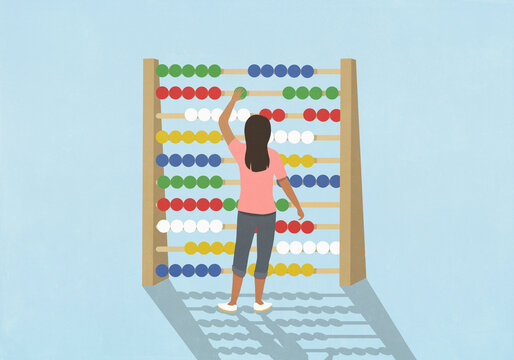 Woman budgeting, adjusting beads on large abacus against blue background
