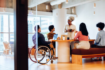 Business team meeting in modern office setting