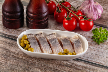 Slided marinated salted herring fillet
