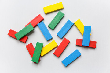 Colorful building blocks on grey background