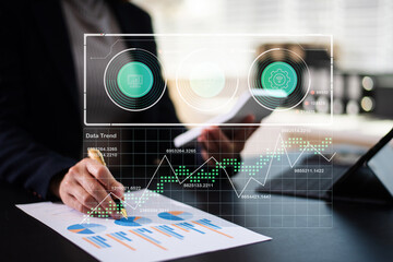 Closeup of smartphone user planning with a futuristic dashboard UI, featuring data visualization, calendar interface, and real peopl