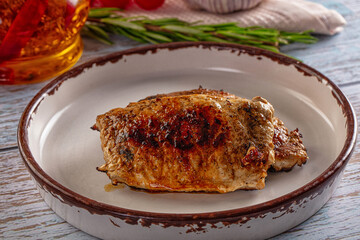 Roasted pork schnitzel steak piece