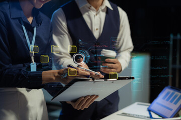 Businessman working on laptop computer with digital document, managing files data, paperless workflow, data search, cloud technology.