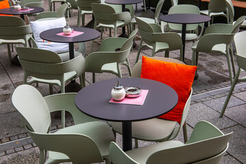 Tables and chairs outdoors in a street restaurant or cafe in Germany