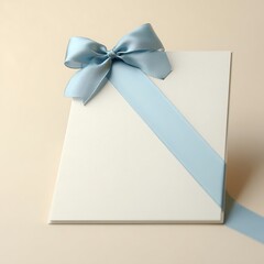 Elegant White Invitation Card Wrapped in Light Blue Satin Ribbon Bow for Wedding Birthday or Formal Celebration Presentation