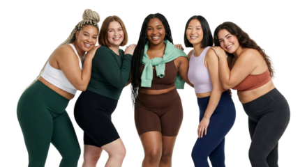 Diverse group of confident young women wearing activewear posing for a studio shot with happiness