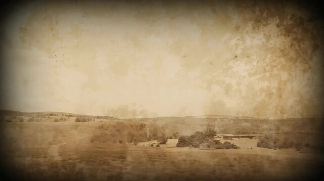 Slight right shift moving camera revealing farm cluster in fields, sepia grain evoking retro look