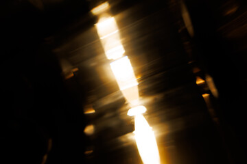 Fototapeta premium Lens Flare. Light over black background. Easy to add overlay or screen filter over photos. Abstract sun burst with digital lens flare background. Gleams rounded and hexagonal shapes.
