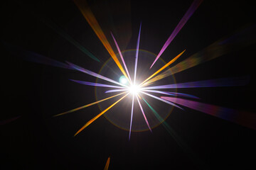 Lens Flare. Light over black background. Easy to add overlay or screen filter over photos. Abstract...