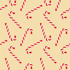 Christmas candy cane seamless pattern with red stripes on soft beige background.